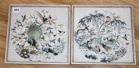 A set of four Chinese silkwork panels depicting birds and flowers, housed back to back in two frames, c.1910, 26.5 x 27cm